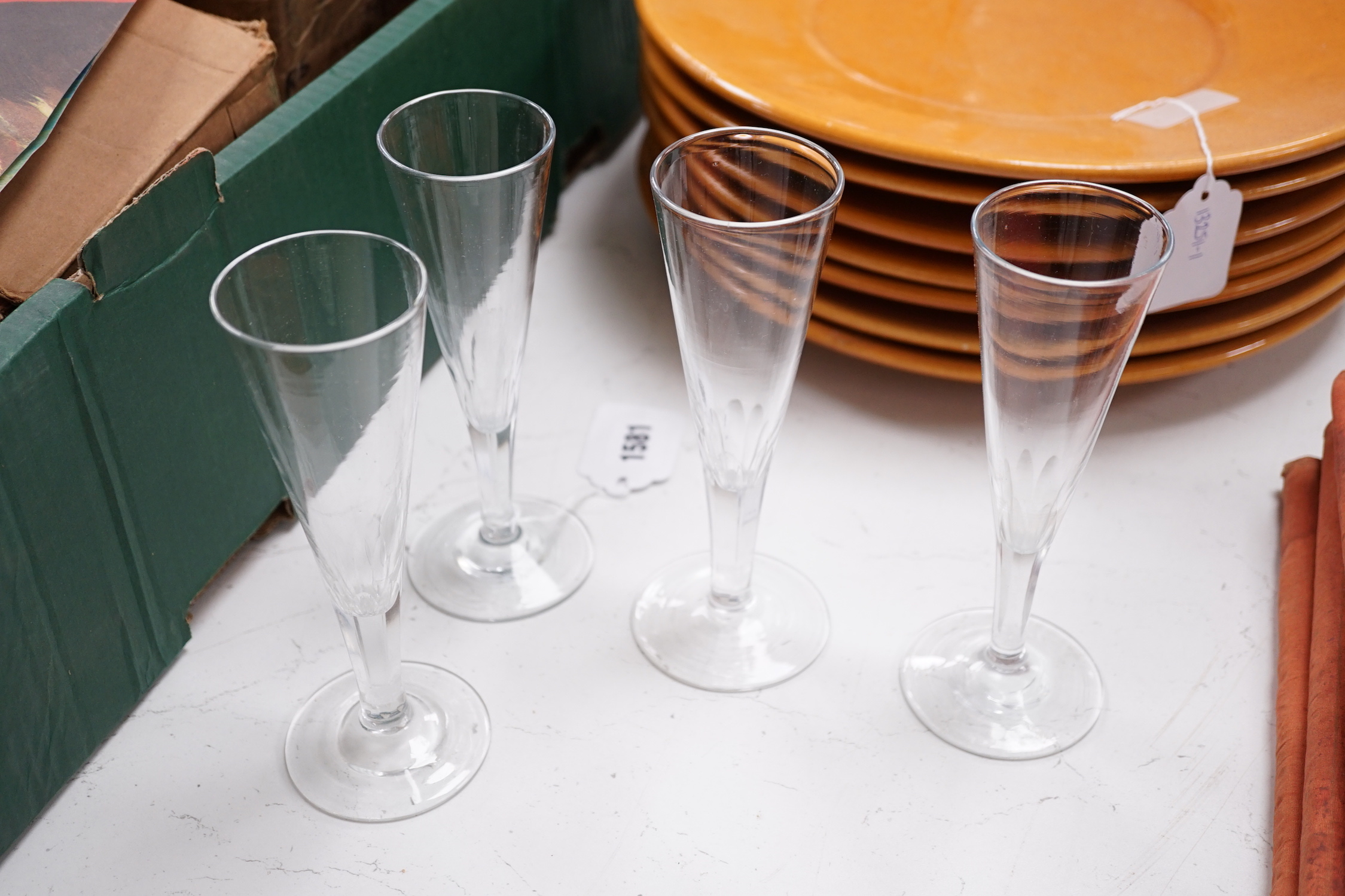 A set of eight cut glass champagne flutes, 18cm